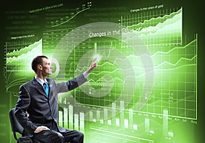 Businessman using media interface