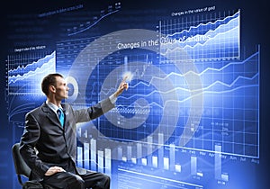 Businessman using media interface