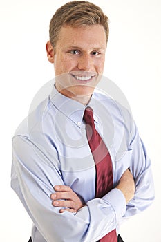 Young businessman smiling