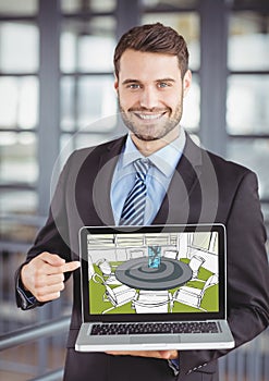 Young businessman smiling and sawing the design of the new meeting room on the computer (green, gre