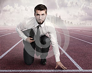 Young businessman in the starting position