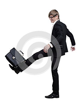 Young businessman strikes foot for the briefcase