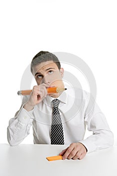 Young businessman student thinking with pencil