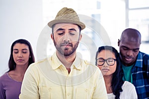 Young businessman with team relaxing