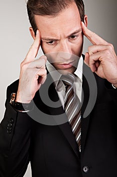 Young Businessman Is Thinking Hard