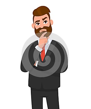 Young businessman thinking something and crossed arm and holding index finger on jaw. Thoughtful businessman looking up thinking.