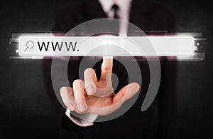 Young businessman touching web browser address bar with www sign