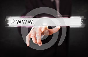 Young businessman touching web browser address bar with www sign