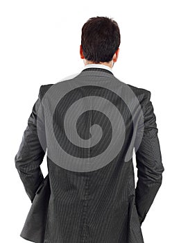 Young businessman turning his back to camera