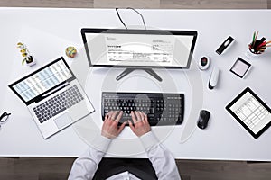 Young Businessman Using Laptop