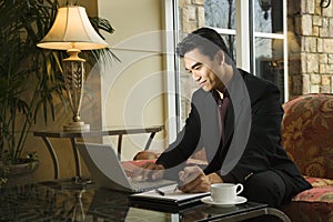 Young Businessman using Laptop