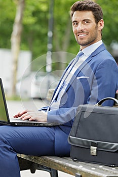 young businessman using laptop