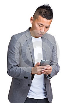 Young businessman using mobile phone