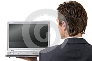 Young businessman watching in laptop