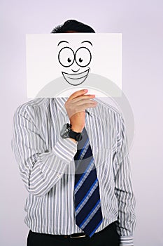 Young Businessman Wearing smile widely Mask isolated on white