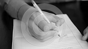 Young businessman or worker or employee signing down the white blank paper.