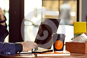 Young businessman working at coffee shop