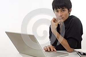 Young businessman working with computer