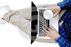 Young businessman working at laptop computer with hot coffee in hand , Business Research, business man hand working on laptop