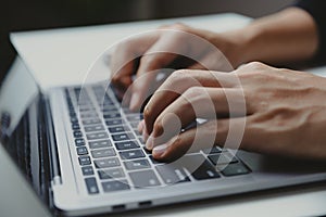 Young businessman working with laptop at home office