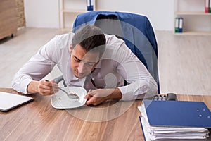 Young businessman working in the office