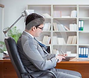 Young businessman working in the office