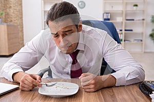 Young businessman working in the office