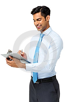 Young Businessman Writing On Clipboard