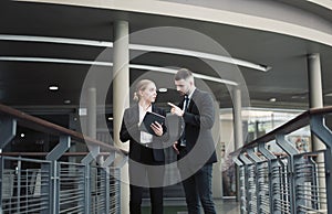 Young businessmen chatting outside the office