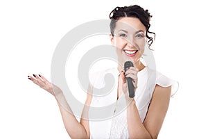 Young businesswoman announcer with microphone on white background