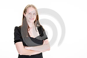 Young businesswoman arms crossed on white background with empty copy space