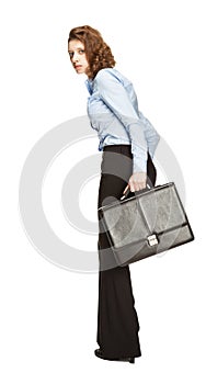 Young businesswoman with briefcase runing away in fright