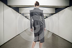 Young businesswoman in a corridor