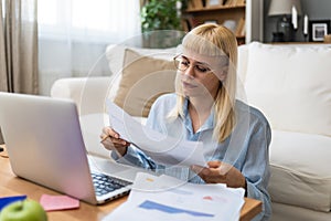 Young businesswoman, expatriate or freelance worker e-commerce and e-learning economy and finance business, using laptop for video photo