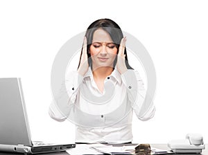 Young businesswoman feeling stressed in an office