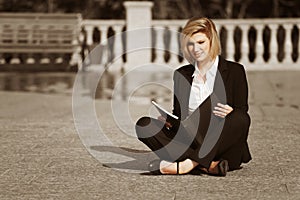 Young businesswoman with a folder