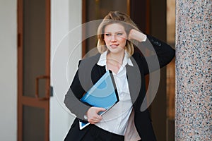 Young businesswoman with a folder