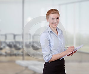 Young Businesswoman with Folio