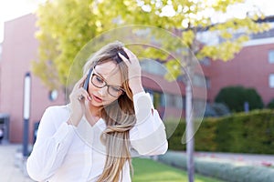 Young businesswoman forget appointment while calling