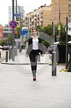 Young businesswoman going to work