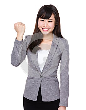Young businesswoman with hand gesture for cheer up