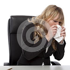 Young businesswoman with hayfever