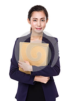 Young businesswoman hold with folder