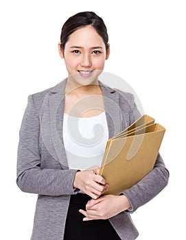 Young businesswoman hold with folder