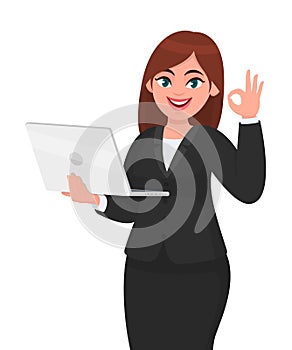 Young businesswoman holding a new digital laptop computer and showing okay, OK gesture sign. Female character design illustration.