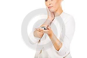 Young businesswoman holding a toy car