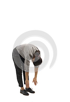 Young businesswoman isolated on white background doing exercises