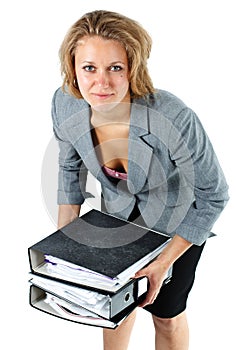 Young businesswoman lifting notepads