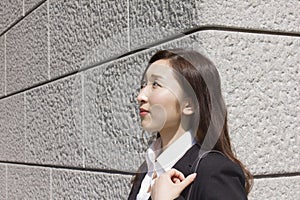 Young businesswoman looking ahea