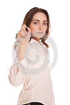 Young businesswoman with marker focus on hand